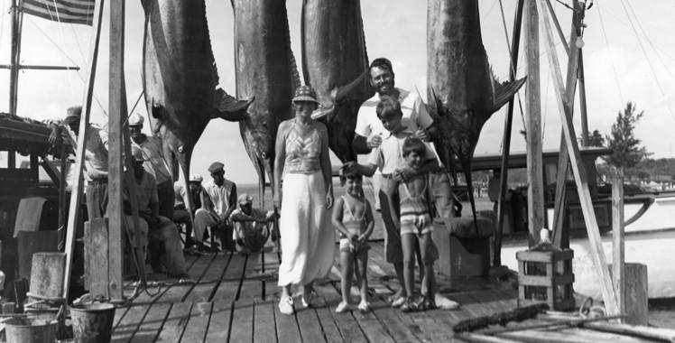 Hemingway with four marlins